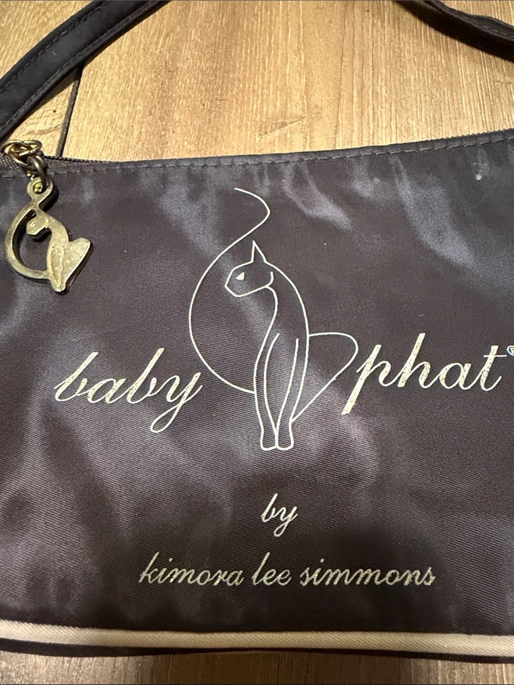 Baby Phat Black Shoulder Bag with Cream Piping and Gold Charm